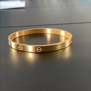 Gold bangle.